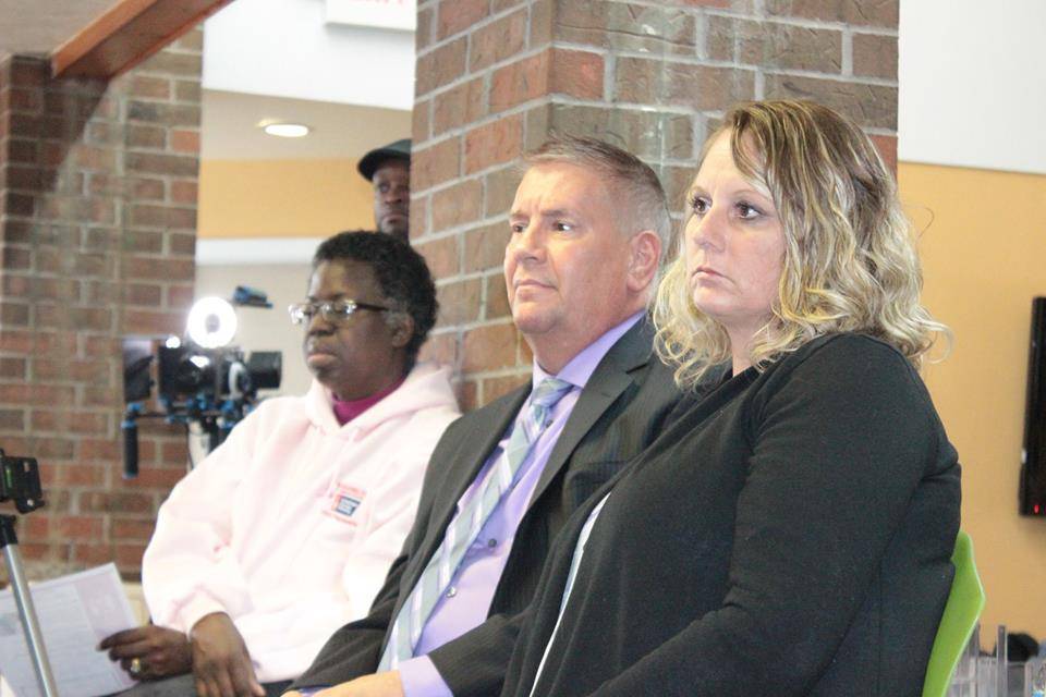Panelists Listening to a Presentation