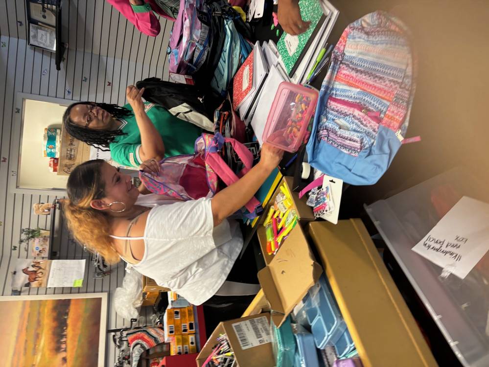 Filling Backpacks with School Supplies