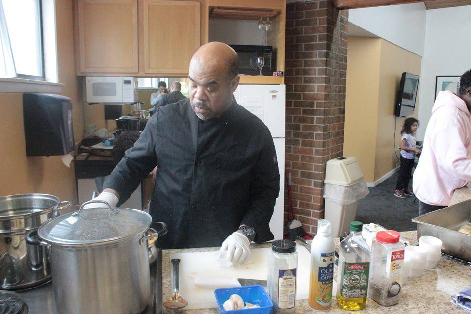 Chef Cooking at the Demo Station